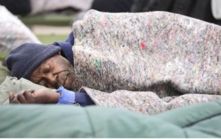 Man sleeping on street
